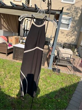 This Women's Xscape Mesh Insets Sleeveless Evening Dress in Black, size 4,